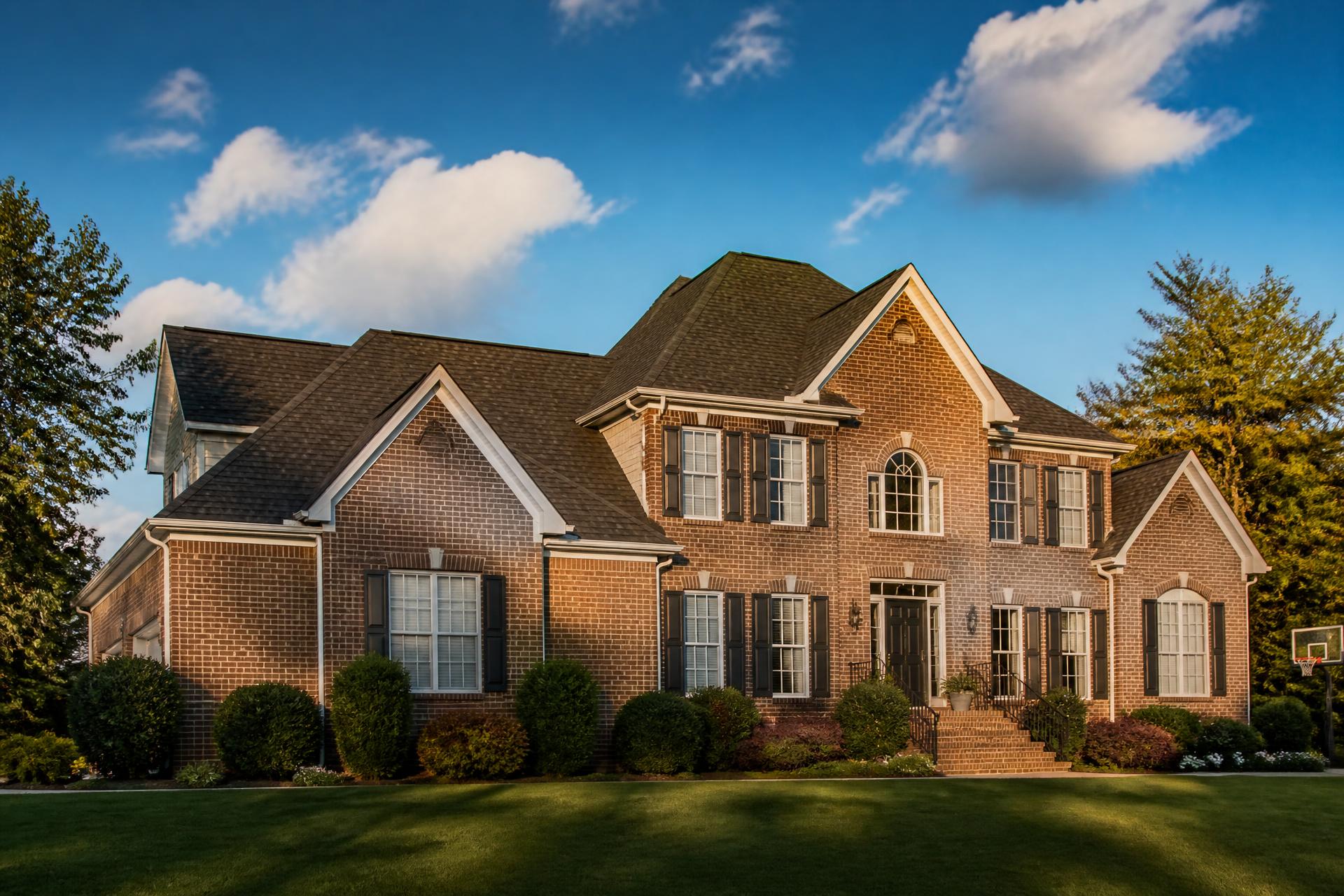 Newly installed architectural shingle roof on a brick home in Huntersville, NC
